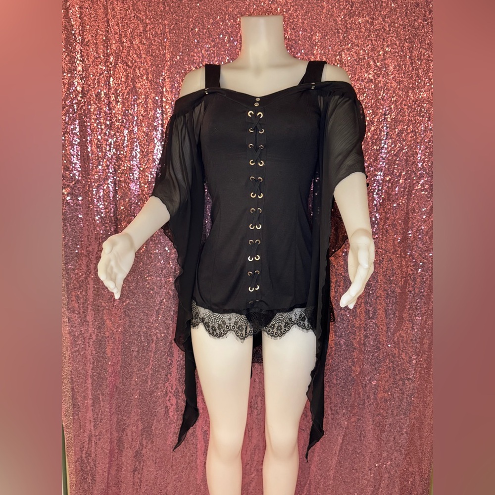 Black corset style hi-low top with beautiful sheer flare half sleeve. Size M